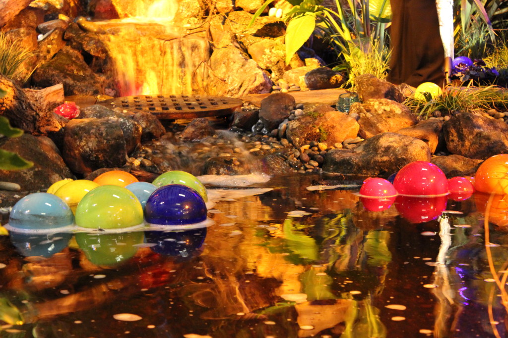 Floating balls of glass reflect water in this garden. photo by Holly Guenther