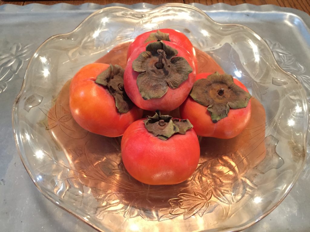 Fuyu persimmons in bowl. (photo by Anne)